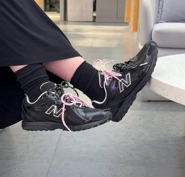 New Balance 2002R – noir vernis