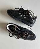 New Balance 2002R – noir vernis